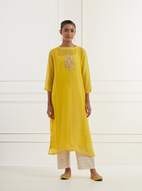 Canary yellow chanderi kurta with pintucks, centre moif pittan embroidery and cotton mulmul slip paired with natural white cotton flax straight fit pants with pittan embroidery
