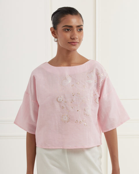 Pink linen top with intricate thread and pittan embroidery paired with offwhite straight fit embroidered cotton pants