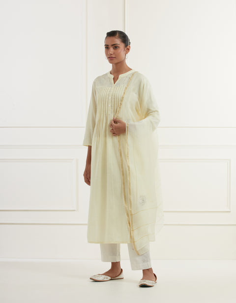 Lemon yellow slub kurta with pleates and pittan flower embroidery yoke details paired with straight pants and chanderi dupatta with pittan flower embroidery