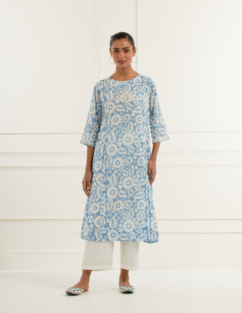 Sky blue floral block print kurta in cotton mulmul with blue embroidered side panels  paired with embroidered offwhite  cotton straight fit pants