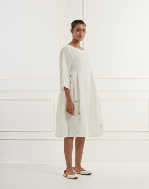 White Linen Pleated Dress With Silver And Blue Embroidery All Over And At The Back Paired With Cotton Slip