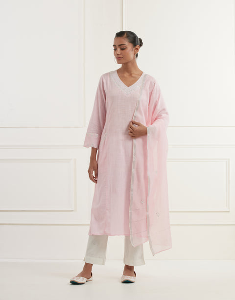 Pink cotton slub 3 panel kurta with thread and  pittan embroidery at neck, sleeves and pockets paired with embroidered offwhite slim pants and pink chanderi dupatta embroidered with pittan booti